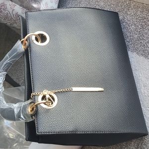 Badgley Mischka TOTE. with big logo eyelet